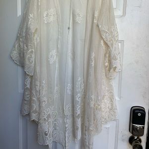 Woman’s lace duster